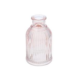 Petit vase en verre rose